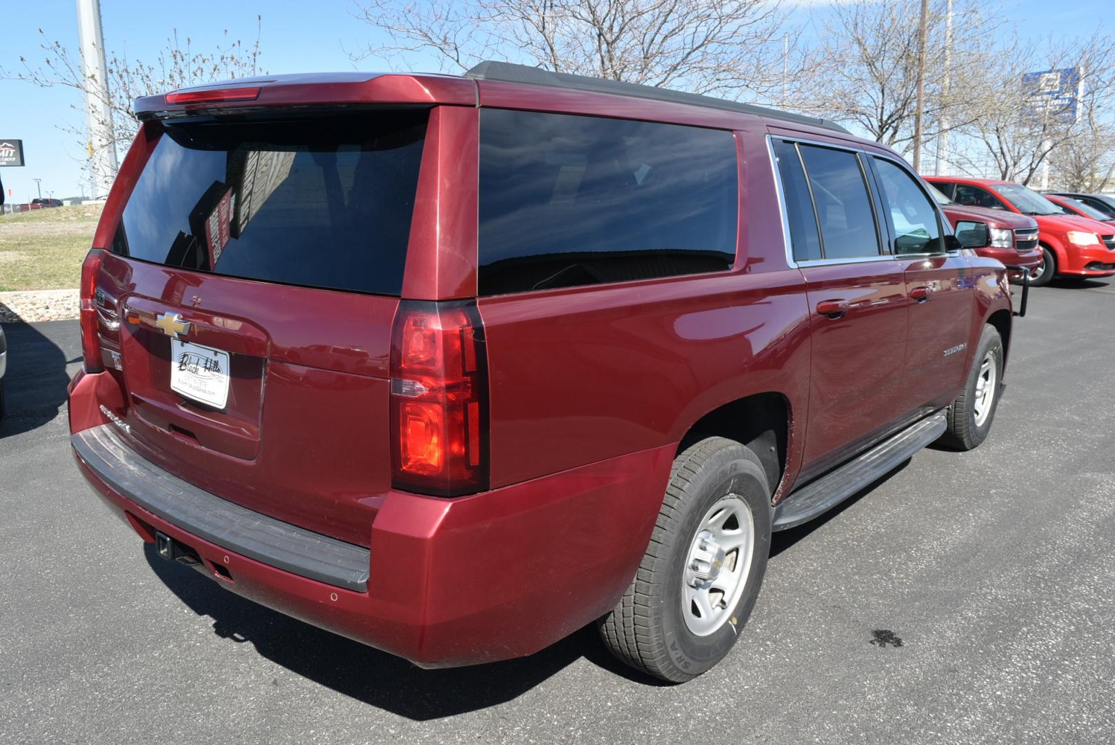 2019 Maroon /Black Chevrolet Suburban LS Fleet (1GNSKKKCXKR) with an 5.3L V-8 engine, 6-Speed Automatic transmission, located at 1600 E Hwy 44, Rapid City, SD, 57703, (605) 716-7878, 44.070232, -103.171410 - Photo#7